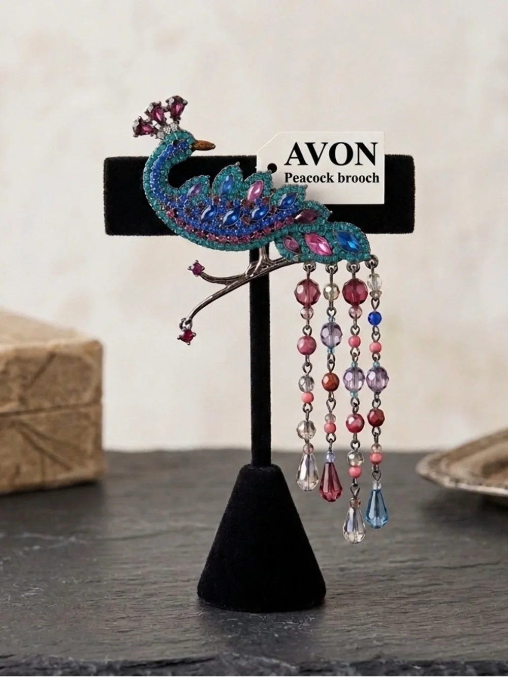 Avon Vintage Rhinestone Peacock Brooch with Dangle Bead Tail - Picture 1 of 10